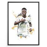 Ladda upp bild till gallerivisning, Framed watercolor-style plakat of Vinícius Jr. celebrating in a Real Madrid jersey with a gold artistic background
