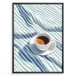 Ladda upp bild till gallerivisning, Minimalist espresso art print plakat featuring a white coffee cup on blue and white striped fabric in a black frame.
