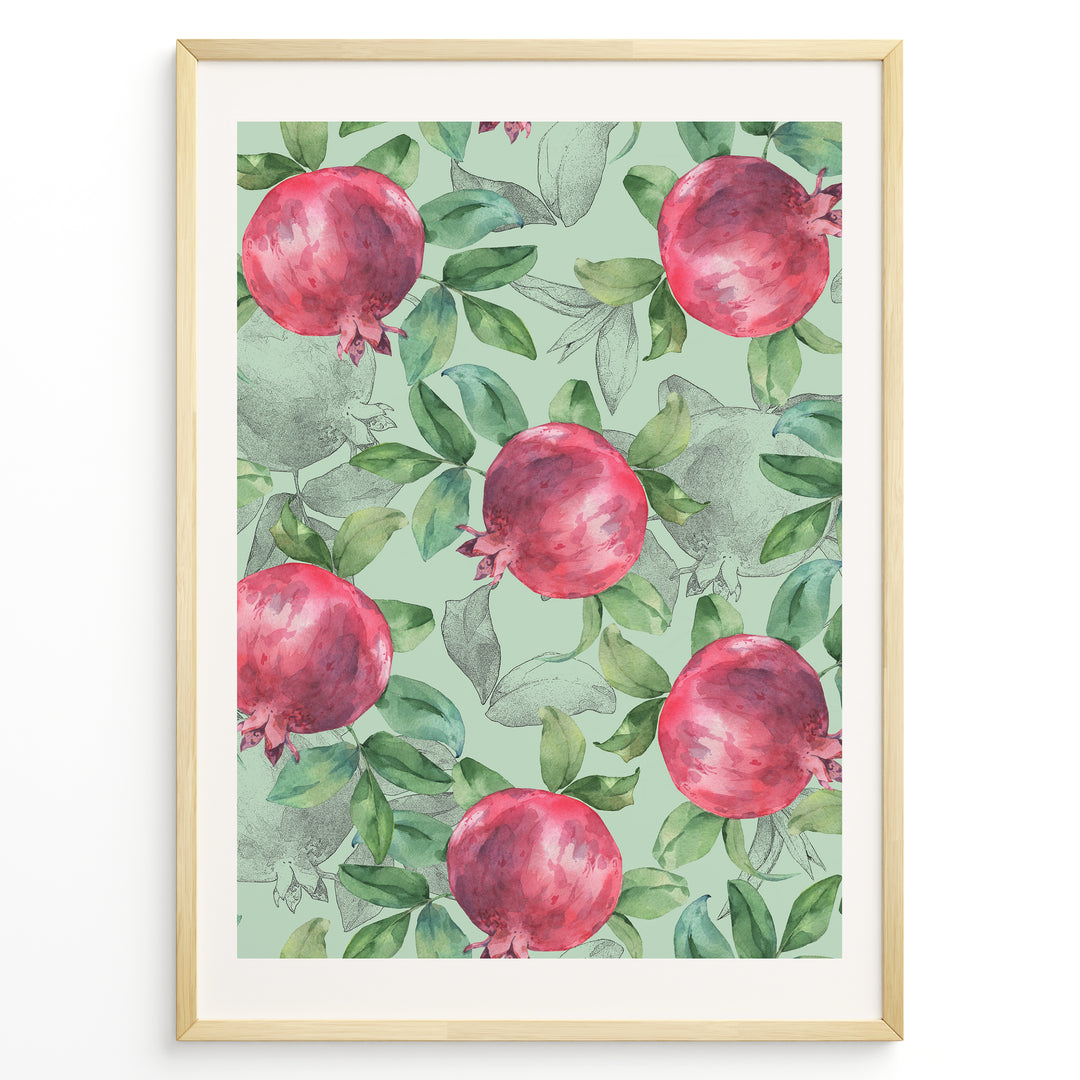 Watercolor botanical poster featuring red pomegranates with green leaves on a mint green background, framed in golden.