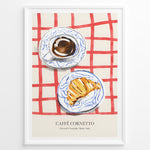Ladda upp bild till gallerivisning, Italian breakfast poster with espresso and croissant on blue-patterned plates over a red checkered tablecloth, titled “Caffè Cornetto.”
