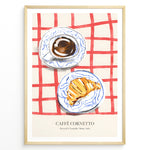 Ladda upp bild till gallerivisning, Italian breakfast poster with espresso and croissant on blue-patterned plates over a red checkered tablecloth, titled “Caffè Cornetto.”
