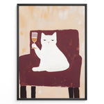 Ladda upp bild till gallerivisning, Funny cat art print plakat showing a white cat sitting on a maroon chair holding a wine glass, framed in black on a beige background.
