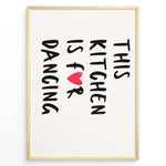 Ladda upp bild till gallerivisning, Minimalist poster with text “This Kitchen Is for Dancing” and a red heart in black font, framed in golden.
