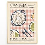 Ladda upp bild till gallerivisning, Vintage French poster with oysters on a plate, lemons, and cutlery over a red-checkered tablecloth, framed in golden.
