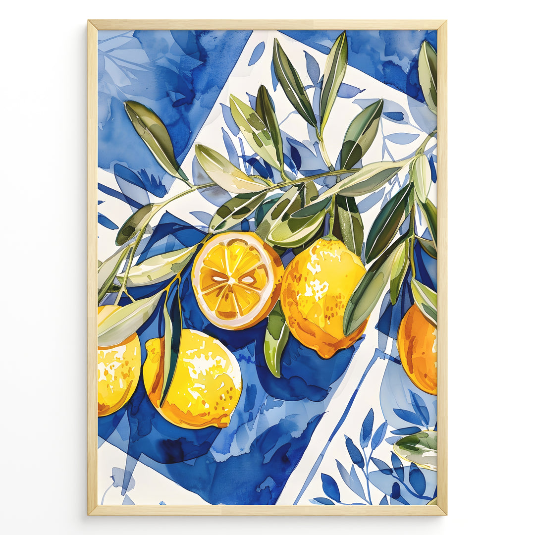 Mediterranean lemon wall art with yellow lemons and olive leaves on blue and white tile background, framed in black, ideal for kitchen or dining room décor.