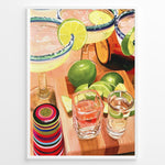 Ladda upp bild till gallerivisning, Colorful margarita cocktail poster with lime slices, tequila shots, and vibrant bar accessories on a wooden counter, ideal for kitchen or home bar wall décor.
