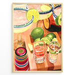 Ladda upp bild till gallerivisning, Colorful margarita cocktail poster with lime slices, tequila shots, and vibrant bar accessories on a wooden counter, ideal for kitchen or home bar wall décor.
