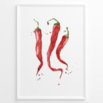 Ladda upp bild till gallerivisning, Watercolor plakat illustration of three red chili peppers with green stems and paint splatters, framed in black, ideal for modern kitchen or dining room décor.
