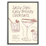 Ladda upp bild till gallerivisning, Minimalist cocktail-themed wall art with line drawings of martini and mojito glasses and the text “Sassy Sips: Easy Breezy Cocktails,” framed in black for kitchen or bar décor.
