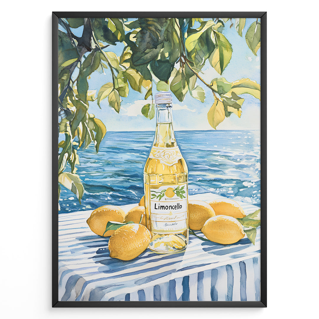 Limoncello art print plakat with a bottle of limoncello, lemons, and green leaves overlooking the blue sea on a striped tablecloth in a black frame.