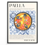 Ladda upp bild till gallerivisning, Watercolor paella wall art showing seafood, rice, and mussels on blue patterned tiles, framed in black, ideal for Spanish kitchen or restaurant wall decoration.
