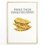 Ladda upp bild till gallerivisning, Funny kitchen wall art with three illustrated tacos and the quote “Inhale Tacos, Exhale Negativity,” framed in black, ideal for Mexican food lovers and modern kitchen décor.
