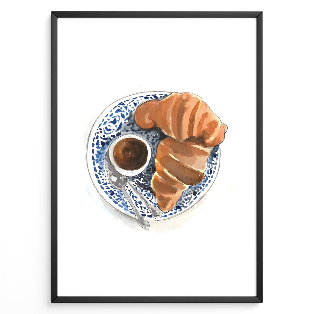 Watercolor wall art of a croissant and espresso cup on a blue decorative plate, ideal for French café, kitchen, or breakfast nook wall décor.