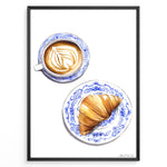 Ladda upp bild till gallerivisning, Art print of a cappuccino and croissant on blue patterned plates — French café-style kitchen wall décor.
