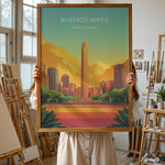 Ladda upp bild till gallerivisning, Buenos Aires Vintage Travel Plakat | Vintage Travel Poster | Denne plakat viser en illustration af et monument i Buenos Aires omgivet af moderne bygninger. Farverne går fra turkis til orange og gul, som skaber en livlig atmosfære.
