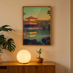 Ladda upp bild till gallerivisning, Kinkaku-ji Vintage Travel Plakat | Vintage Travel Poster | Denne plakat viser Den Gyldne Pavillon i Kyoto, Japan, med sin gyldne facade, omgivet af frodig natur og en rolig vandflade.
