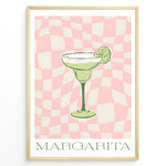 Ladda upp bild till gallerivisning, Retro-style Margarita cocktail poster featuring a green drink with a lime slice on a pink and cream checkered background, framed as modern kitchen or bar wall art.
