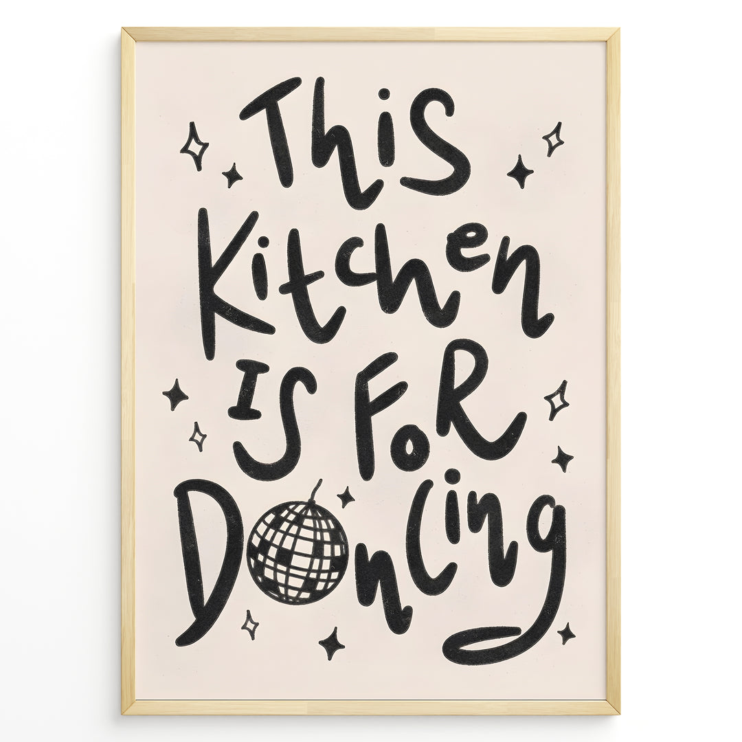 Black and white quote print reading “This Kitchen Is for Dancing” with a disco ball illustration.