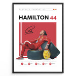 Ladda upp bild till gallerivisning, Framed Hamilton 44 Scuderia Ferrari F1 poster showing the driver in a red suit leaning on tires, holding a yellow helmet, with signature and career stats.
