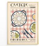 Ladda upp bild till gallerivisning, Vintage French oysters poster with illustrated oyster platter, lemon slices, and cutlery on a pink checkered background in a golden frame.
