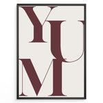 Ladda upp bild till gallerivisning, Minimalist typography wall art print plakat with the word “YUM” in large maroon letters on a cream background framed in black.
