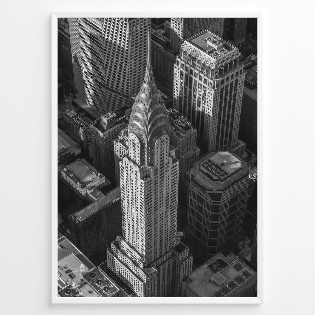 Fashion Plakat | Aerial View of the Chrysler Building in Black and White Plakaty.dk | Black and white aerial view of the Chrysler Building surrounded by New York City skyscrapers.