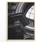 Ladda upp bild till gallerivisning, Fashion Plakat | Architectural Elegance: Classical Interior with Ornate Column and Dome Plakaty.dk | Close-up photograph of an ornate Corinthian column supporting a decorated entablature beneath a domed ceiling with intricate molding and classical architectural detailing.
