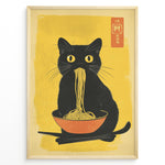 Ladda upp bild till gallerivisning, Japanske plakater | Illustration of a black cat with yellow eyes eating noodles from an orange bowl, set against a yellow background with Asian characters in the corner.
