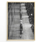 Ladda upp bild till gallerivisning, Fashion Plakat | Black &amp; White Fashion Runway – Editorial Wall Art Print Plakaty.dk | Black and white photograph of runway models walking in a single-file line during a fashion show, with seated spectators on one side of the runway.

