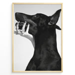 Ladda upp bild till gallerivisning, Fashion Plakat | Black and White Fashion Art Print – Dog with Hand Adorned in Rings Plakaty.dk | Black and white artistic photo of a black dog with a human hand wearing multiple rings gently placed on its jaw.
