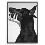 Ladda upp bild till gallerivisning, Fashion Plakat | Black and White Fashion Art Print – Dog with Hand Adorned in Rings Plakaty.dk | Black and white artistic photo of a black dog with a human hand wearing multiple rings gently placed on its jaw.
