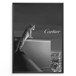 Ladda upp bild till gallerivisning, Fashion Plakat | Cartier Panther Over the City: Iconic Elegance in Monochrome Plakaty.dk | Black and white image of a panther perched on a Cartier box overlooking a city skyline at night, with the Cartier logo in the sky.
