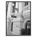 Ladda upp bild till gallerivisning, Fashion Plakat | Chanel Boutique Exterior – Monte Carlo, Monaco Plakaty.dk | Black and white photo of the Chanel storefront in Monte Carlo, Monaco, showcasing ornate architecture with columns, balconies, and a hanging sign.
