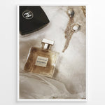 Ladda upp bild till gallerivisning, Fashion Plakat | Chanel Gabrielle Perfume Flat Lay with Earrings and Compact – Luxury Beauty Print Plakaty.dk | Flat lay image of Chanel Gabrielle perfume, a black Chanel compact, and gold statement earrings on soft white fabric.
