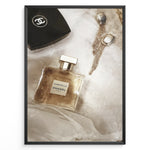 Ladda upp bild till gallerivisning, Fashion Plakat | Chanel Gabrielle Perfume Flat Lay with Earrings and Compact – Luxury Beauty Print Plakaty.dk | Flat lay image of Chanel Gabrielle perfume, a black Chanel compact, and gold statement earrings on soft white fabric.
