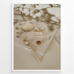 Ladda upp bild till gallerivisning, Fashion Plakat | Chanel No. 5 Perfume Flat Lay with Watch and Books – Neutral Aesthetic Print Plakaty.dk | Flat lay of Chanel No. 5 perfume bottle, gold watch, ring, and decorative shell on fashion books with soft floral blur in neutral tones.
