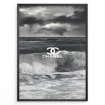 Ladda upp bild till gallerivisning, Fashion Plakat | Chanel Ocean Wave Black &amp; White Fashion Poster Plakaty.dk | Black and white ocean wave poster with the Chanel logo centered over crashing waves and a stormy sky.

