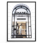 Ladda upp bild till gallerivisning, Fashion Plakat | Chanel Storefront Window – Fashion Photography Print Plakaty.dk | Photograph of a Chanel boutique storefront window with elegant black framing and luxury fashion items on display.

