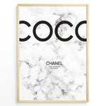 Ladda upp bild till gallerivisning, Fashion Plakat | Coco Chanel Quote Poster on Marble Background – Fashion Wall Art Plakaty.dk | Minimalist poster with large &quot;COCO&quot; text and a Chanel quote on a white marble background: &quot;I don&#39;t do fashion, I am fashion.&quot;

