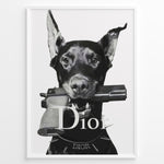 Ladda upp bild till gallerivisning, Fashion Plakat | Dior Guard Dog – Bold Fashion Art Print Plakaty.dk | Black and white image of a Doberman dog holding a handgun in its mouth, wearing a spiked collar with the Dior logo, against a plain background.
