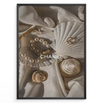 Ladda upp bild till gallerivisning, Fashion Plakat | Elegant Chanel-Inspired Flat Lay with Seashells and Jewelry Plakaty.dk | Flat lay of elegant seashells, a pearl bracelet, and gold jewelry on soft ivory fabric with the Chanel logo centered.
