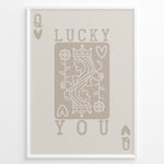 Ladda upp bild till gallerivisning, Framed minimalist “Lucky You” poster featuring Queen of Hearts playing card design in beige tones on a neutral background.
