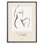 Ladda upp bild till gallerivisning, Framed La Femme poster featuring minimalist female silhouette line art in black on a beige background with modern typography.
