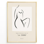 Ladda upp bild till gallerivisning, Framed La Femme poster featuring minimalist female silhouette line art in black on a beige background with modern typography.
