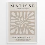 Ladda upp bild till gallerivisning, Framed Matisse Papiers Découpés poster with abstract beige cut-out shapes and black typography on a neutral background.
