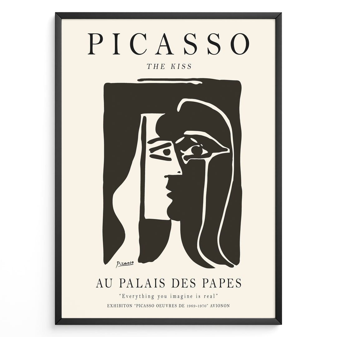 Framed Picasso “The Kiss” poster with two abstract faces in black on a beige background.