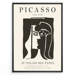 Ladda upp bild till gallerivisning, Framed Picasso “The Kiss” poster with two abstract faces in black on a beige background.

