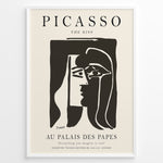 Ladda upp bild till gallerivisning, Framed Picasso “The Kiss” poster with two abstract faces in black on a beige background.
