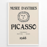 Ladda upp bild till gallerivisning, Framed Picasso Musée d’Antibes 1948 exhibition poster with a minimalist face illustration and vintage typography on a beige background.
