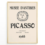 Ladda upp bild till gallerivisning, Framed Picasso Musée d’Antibes 1948 exhibition poster with a minimalist face illustration and vintage typography on a beige background.

